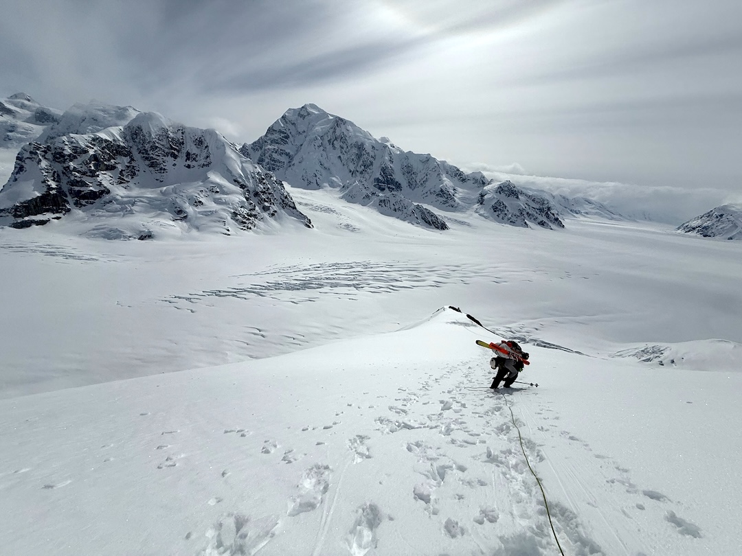 Slogging up Mt. Crosson, following some other climbers’ tracks. Begguya (Mt. Hunter) is prominent in the back, above Kahiltna Base Camp. 
