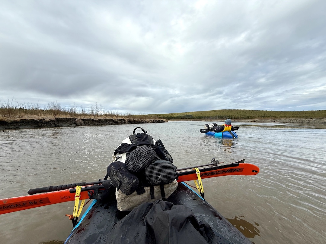 Relaxing in the rafts during a mellow stretch of the Foraker River. 

