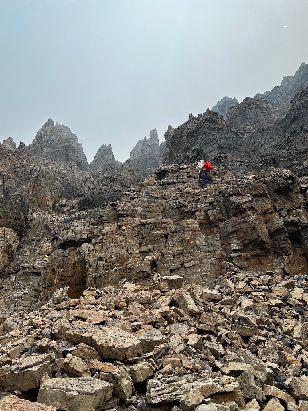 Nick Baggaley climbing back to the east ridge of Stutfield Peak East during the first ascent of No Fiesta, No Siesta (1,200m, TD- 5.8). 
