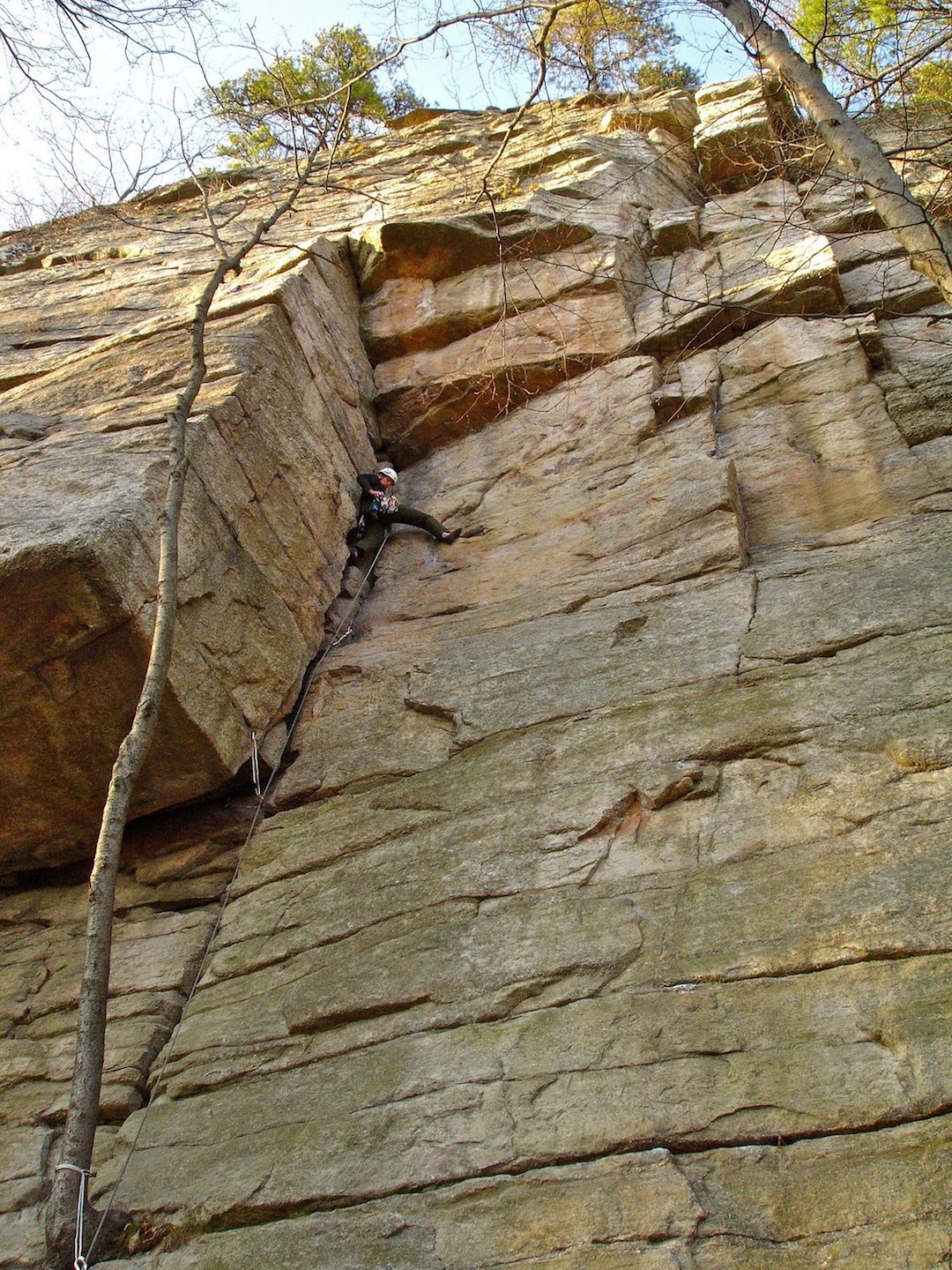 Horseman is a renowned Gunks classic. Established as two pitches, the route is now typically done in one 120-foot pitch. In summer 2025, a climber fell 75 feet from near the top due to rope drag and fatigue. Managing rope drag through the traverse requires the judicious use of long runners. 

